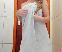 Leaving the bath to just a towel, dancing coupled to applying body cream